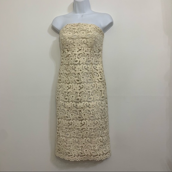 Ivory lace dress by Michael Kors is in like new condition. Size 2 - Picture 5 of 16